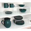 Single Layer Kitchen Metal Shelf Organizer displaying green plates and mugs on two levels for efficient storage.