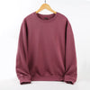 Unisex Oversized Blank Hoodies displayed on a hanger in a cozy maroon color, perfect for everyday wear.