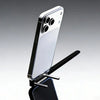 T-Shaped Design Type-C Portable Charging Accessory supporting a smartphone for stable charging and connectivity.