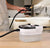 High Temperature 2500W Steam Cleaning Machine in use for deep cleaning kitchen surfaces.