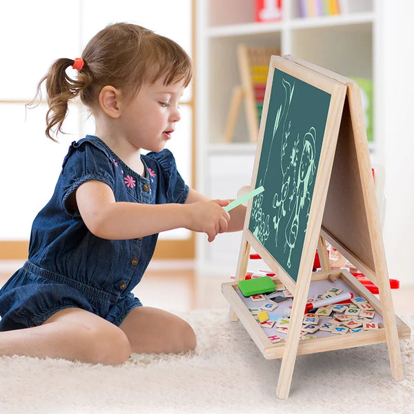 Young girl drawing on a Wooden Double-Sided Drawing Blackboard & Whiteboard, promoting creativity and learning.
