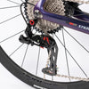Close-up of the rear derailleur on a 2nd Generation 24-Speed Flat Bar Road Bike.