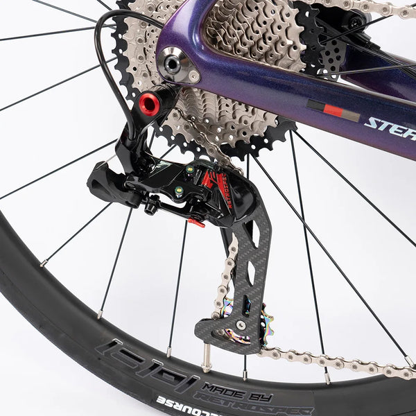 Close-up of the rear derailleur on a 2nd Generation 24-Speed Flat Bar Road Bike.