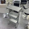 Aluminium Salon Trolley with multiple storage compartments, mobile design, perfect for busy salons and beauty studios.