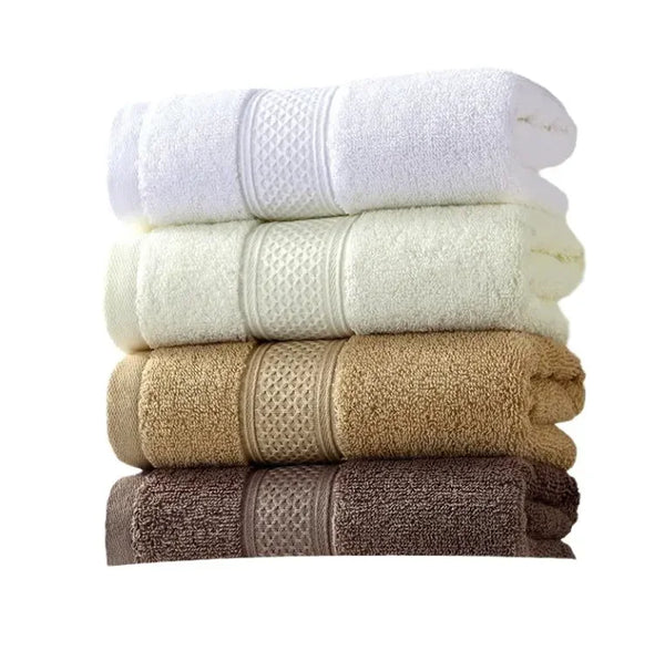 Thick Cotton Face and Hand Towel in multiple colors stacked neatly, showcasing plush texture and softness.