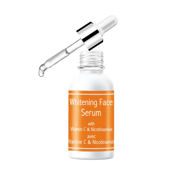 Niacinamide and Vitamin C Dark Spot Serum in a glass dropper bottle for skin brightening.