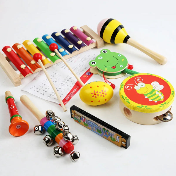 Childrens Wooden Bass Drum Toy and various colorful musical instruments for toddlers.