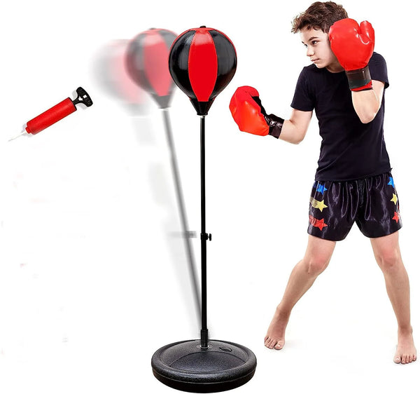 A child practicing boxing with the Height Adjustable Freestanding Reflex Bag Kit, enhancing hand-eye coordination.