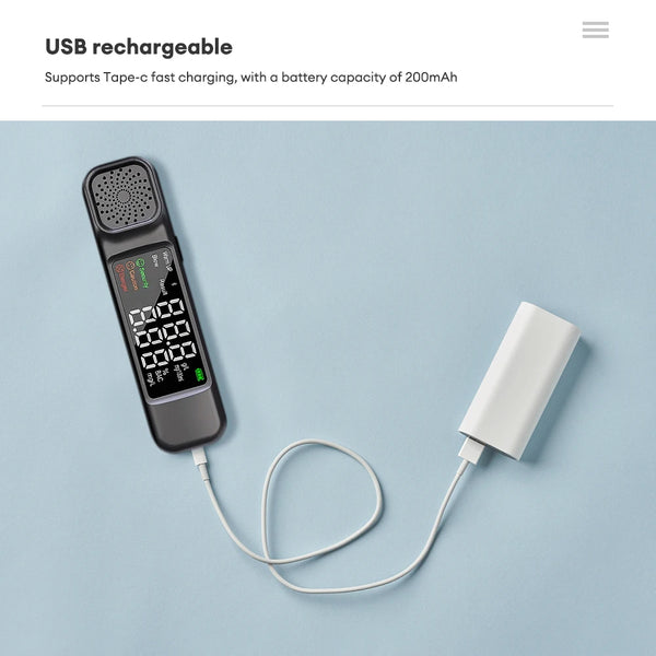 High-precision Alcohol Concentration Detector connected to a USB charger for quick charging.