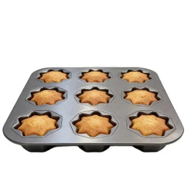 Non-Stick 9-Cavity Square Muffin Pan with perfectly baked star-shaped muffins.