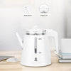 Borosilicate Double Wall Glass Electric Kettle with glass spout and plastic lid displayed on a kitchen countertop.
