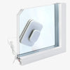 Double-Sided Magnetic Window Cleaner on glass window, designed for easy cleaning from both sides.
