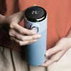 500ml Smart LED Vacuum Insulated Stainless Steel Flask with digital temperature display held in hand