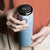 500ml Smart LED Vacuum Insulated Stainless Steel Flask with digital temperature display held in hand