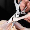 Using Multi-Function Stainless Steel Kitchen Scissors to cut poultry in a kitchen setting.
