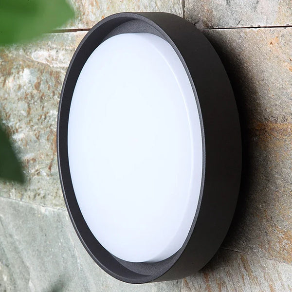 Waterproof Outdoor LED Corridor Ceiling Lamp mounted on a stone wall, designed for outdoor illumination.