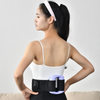 Young woman using a Mini Portable Deep Tissue Fascial Massager Gun on her lower back for muscle relief.