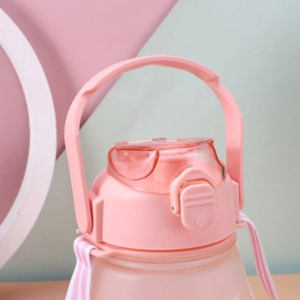 Large 1.1 L Hydration Water Bottle with pink lid and handle, designed for convenient hydration.