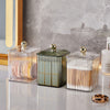 Luxury Transparent Makeup Storage Box with three stylish containers for organizing beauty tools and cotton pads.