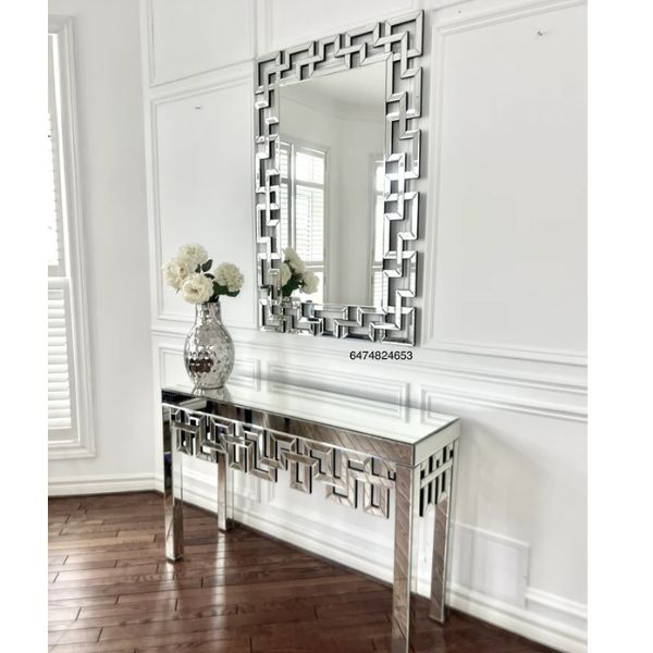 Maze Rectangle Console Table & Mirror Set displayed in a modern entryway with elegant decor.
