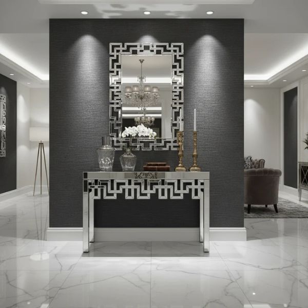 Stylish Maze Rectangle Console Table & Mirror Set displayed in a modern entryway with elegant decor and lighting.