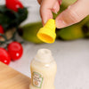 Mini 30ml Plastic Squeeze Bottles with yellow cap, perfect for dispensing sauces and dressings without mess.