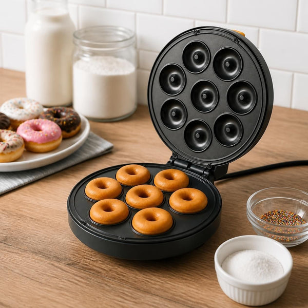 Mini Donut Maker 8-Cavity Donut Baking Machine creating freshly baked mini donuts on a wooden countertop.