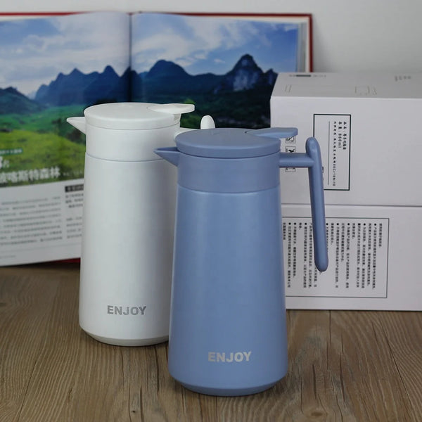 Mocha Exclusive Pot Mini Coffee Maker in white and blue with handle and lid, perfect for home brewing.