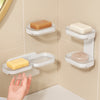 Modern Wall-Mounted Shower Soap Holder displaying multiple soap bars on a bathroom wall, providing organized storage.