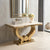 Monaco Gold Console Table 180cm featuring a sleek gold frame and elegant tabletop in a modern interior setting.