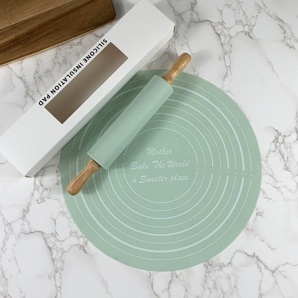 Non-Stick Silicone Rolling Pin & Pastry Mat Baking Set with mint green pastry mat and rolling pin.