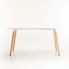 Betty Wooden Leg Dining Table featuring a modern design with wooden legs, ideal for compact dining spaces.