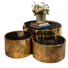 Lucid Gold 3-Piece Nesting Coffee Table Set featuring stylish gold finish and surface for decor.