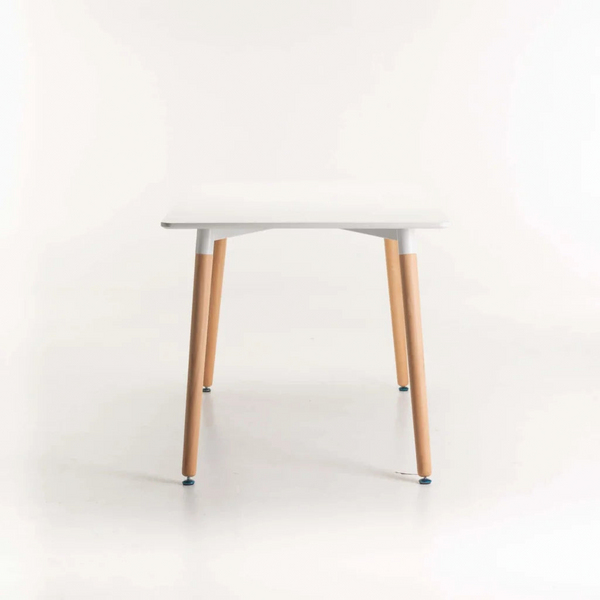 Betty Wooden Leg Dining Table with a modern design and wooden legs, perfect for compact dining spaces.