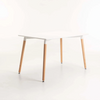 Betty Wooden Leg Dining Table with a clean design and light wooden legs, ideal for modern dining spaces.