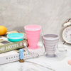Portable Collapsible Silicone Travel Cup set in pink, gray, and blue, showcasing their convenience and portability.
