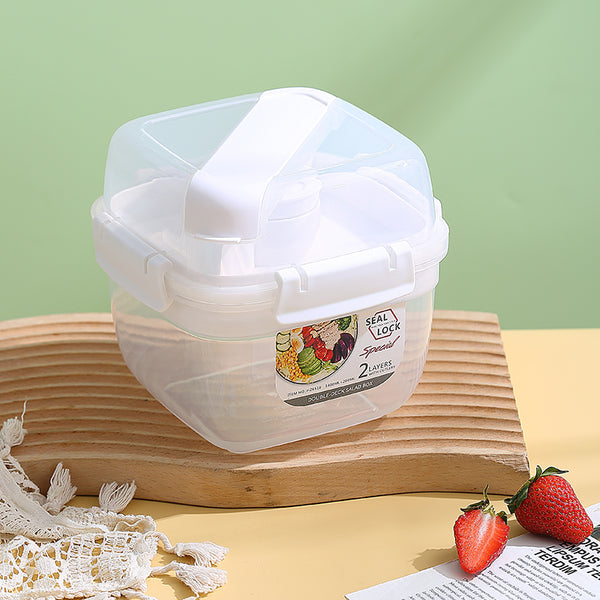 Portable Double-Layer Meal Box with Utensils in clear design for easy meal organization and reheating.