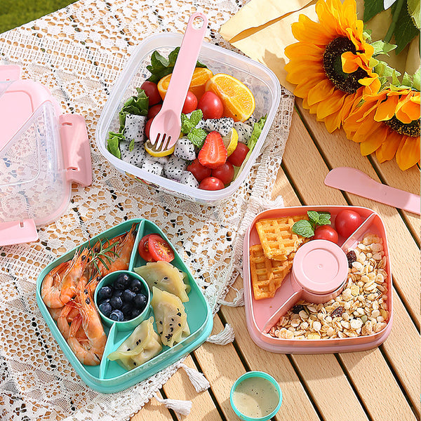 Portable Double-Layer Meal Box filled with fresh salad, shrimp, fruits, and waffles on a picnic table