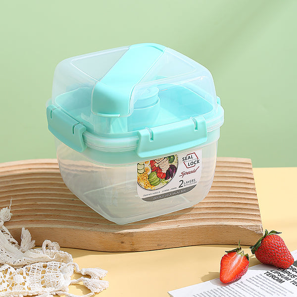 Portable Double-Layer Meal Box with utensils on a wooden board, ideal for healthy meals on the go.