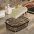 Portable Eco-Friendly Soap Tray holding a green soap bar, designed to keep soap dry and firm.
