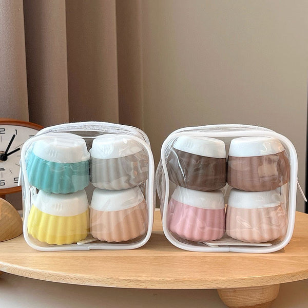 Portable travel silicone bottle set in clear cases, featuring colorful bottles for toiletries, perfect for travel organization.