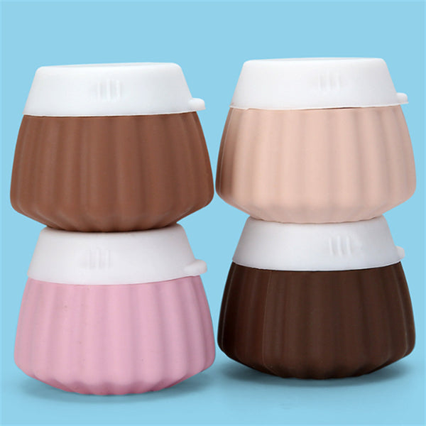 Portable travel silicone bottle set featuring stackable colorful containers for toiletries.