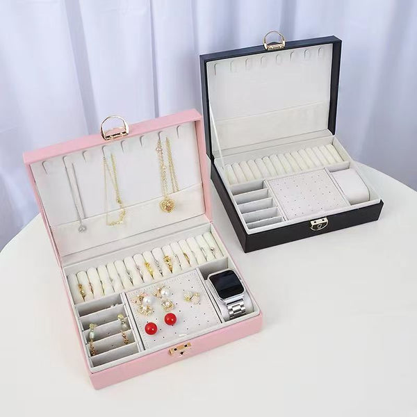 Premium Multi-Compartment Jewelry Box in pink and black, showcasing organized jewelry compartments for accessories.
