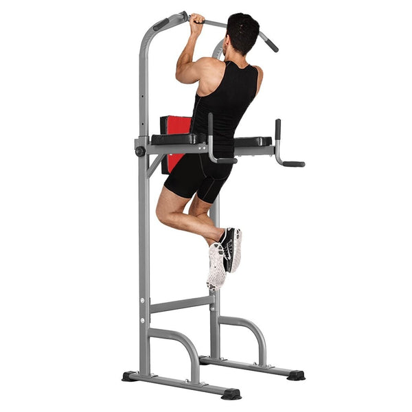 Person performing pull-ups on the Pro Adjustable Power Tower - Multi-Function Home Gym Station.