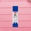 Quick-Dry Mini Glue Stick 9g – School & Office Adhesive in a blue package on a pink wooden background.