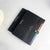 Rainbow A4 Expanding File Folder Concertina File 13 in a stylish black design with colorful section tabs.