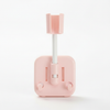 Round Swivel Shower Head Holder Bracket designed in pink, featuring adjustable swivel for optimal shower head positioning.