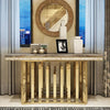 Luxury Gold Stainless Steel Marble Console Table with elegant decor and round mirror in a stylish interior setting.