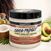 Nourishing Coconut Oil Hair Conditioner in a jar with a tropical background featuring coconut and avocado.