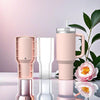 Silicone Cylinder Ice Cube Tray with Lid, pink drink tumbler with ice mold and flowers on a marble table.
